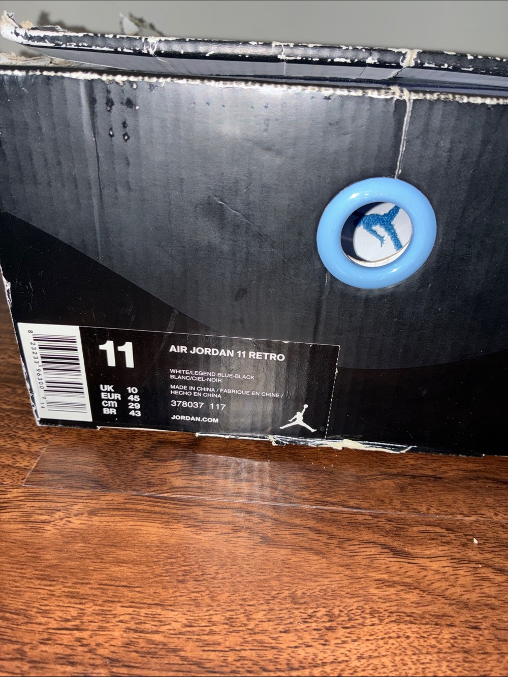 Jordan White and Black Retro High-Top Sneakers - Picture 7 of 7